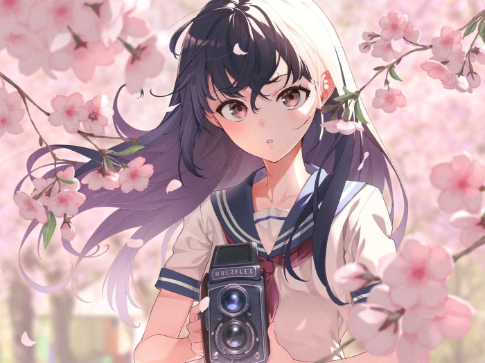 Girl with purple hair holding a camera