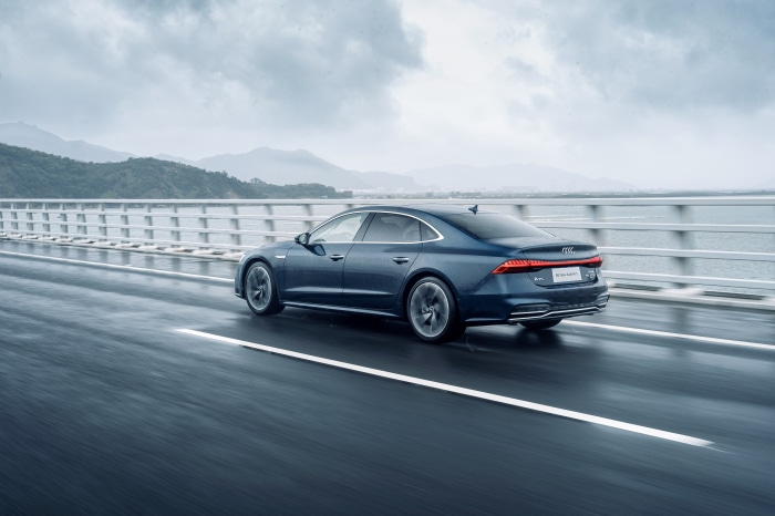 Audi A7L 55 TFSI quattro S line on a bridge