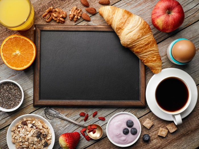 Breakfast still life with chalkboard