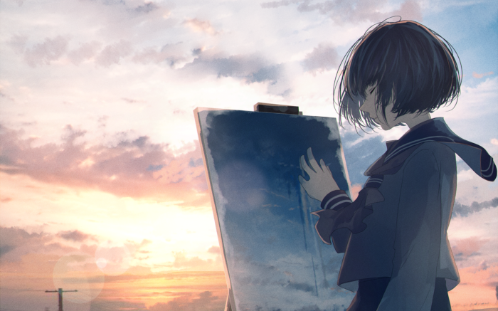 Girl painting a canvas at sunset