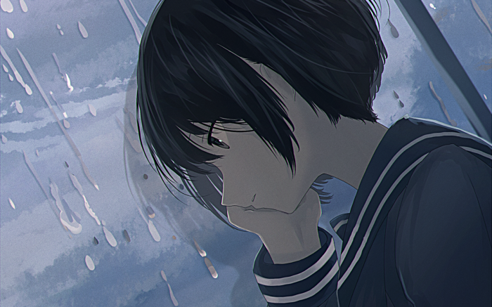 Girl in a sailor uniform looking down
