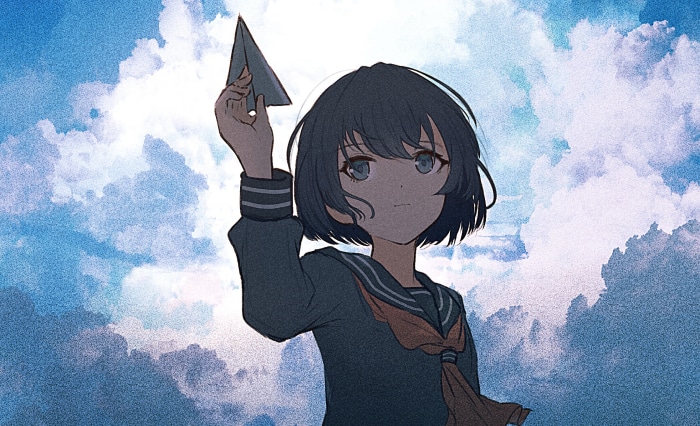 Girl holding a paper airplane against a cloudy sky