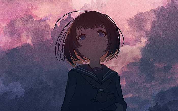 Girl looking up at pink clouds