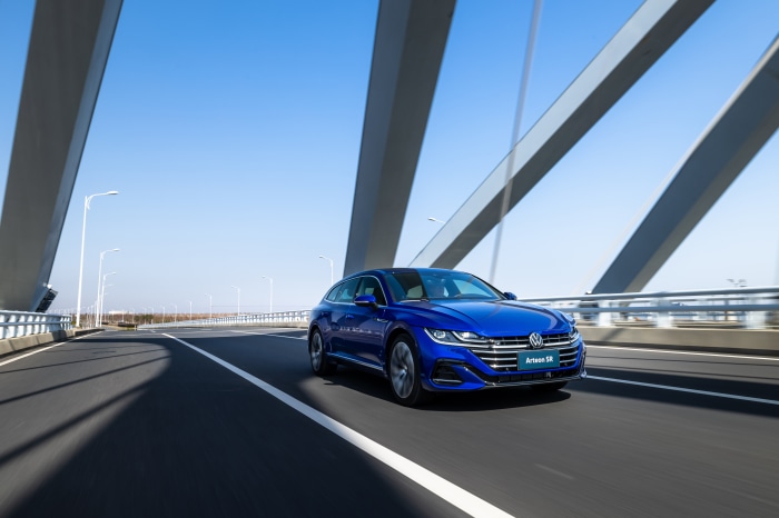 Blue Volkswagen Arteon Shooting Brake R-Line on a bridge