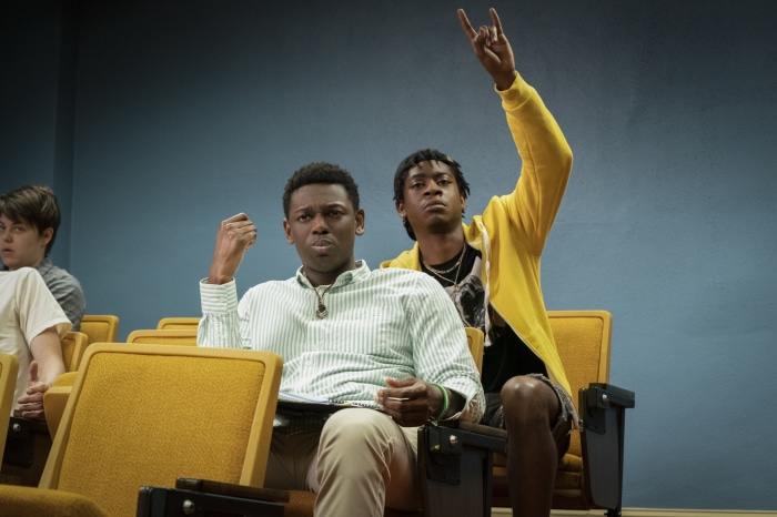 Two young men in a classroom