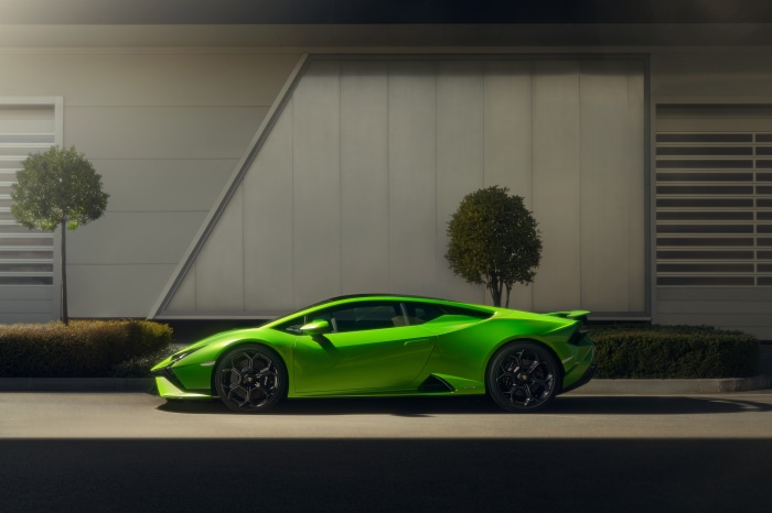 Green Lamborghini Huracán Tecnica parked outside building