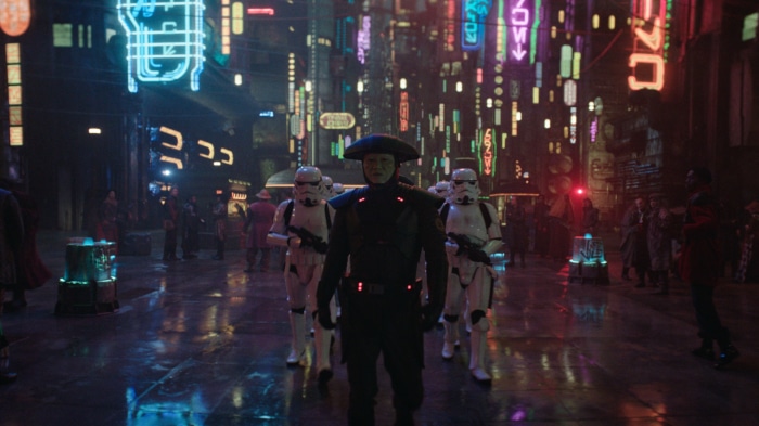 Reva Sevander and Stormtroopers in a Neon City