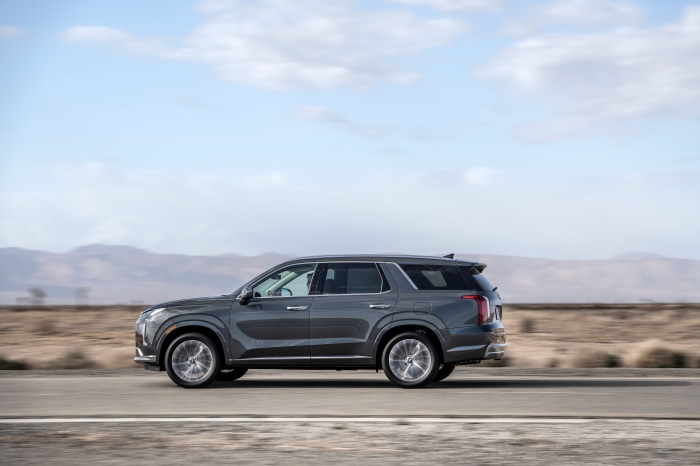 Hyundai Palisade driving on a road