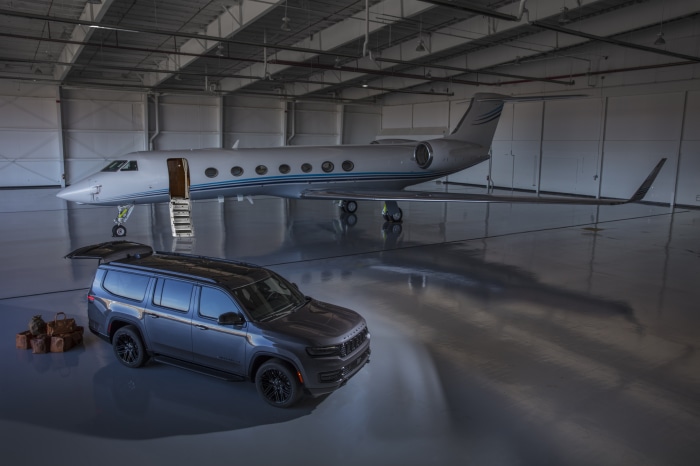 Jeep Wagoneer and Gulfstream Jet in Hangar