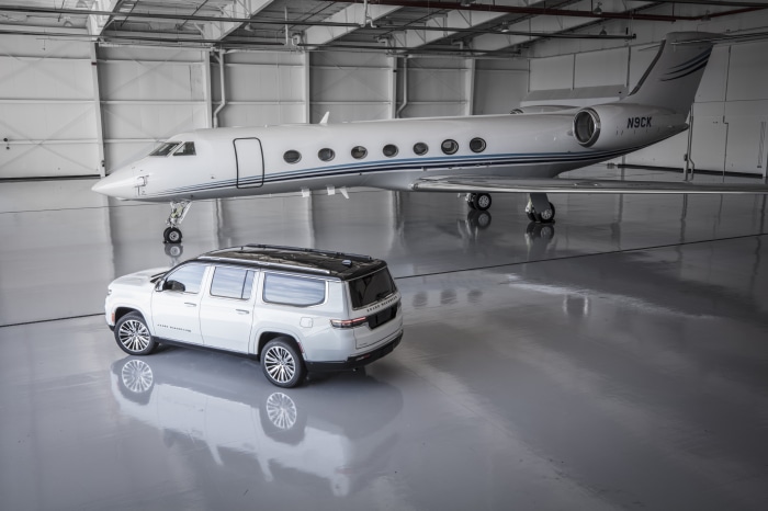 Jeep Wagoneer and N9CK Gulfstream G550 in hangar