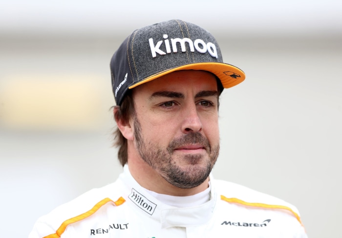 Fernando Alonso wearing a Kimoa McLaren cap