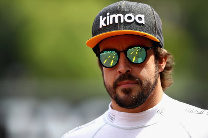 Fernando Alonso wearing Kimoa cap and sunglasses