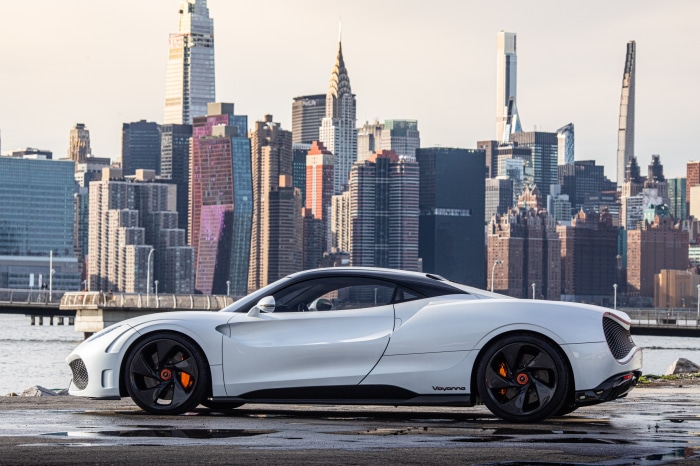 Deus Vayenne Concept car in front of New York City skyline