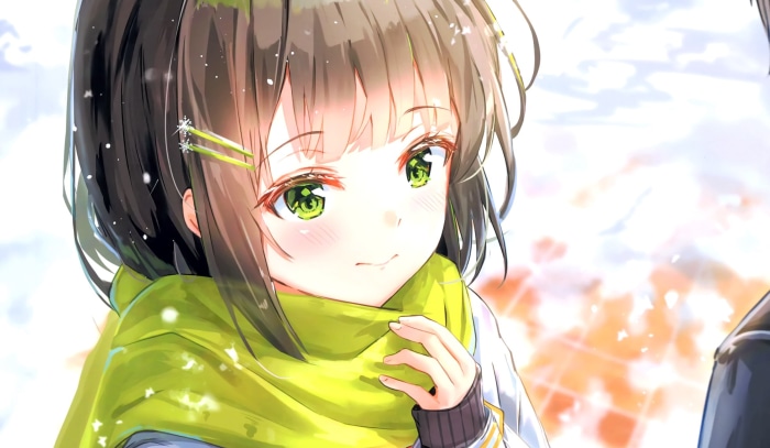 Girl with green scarf in snow