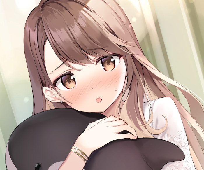Girl hugging a stuffed animal