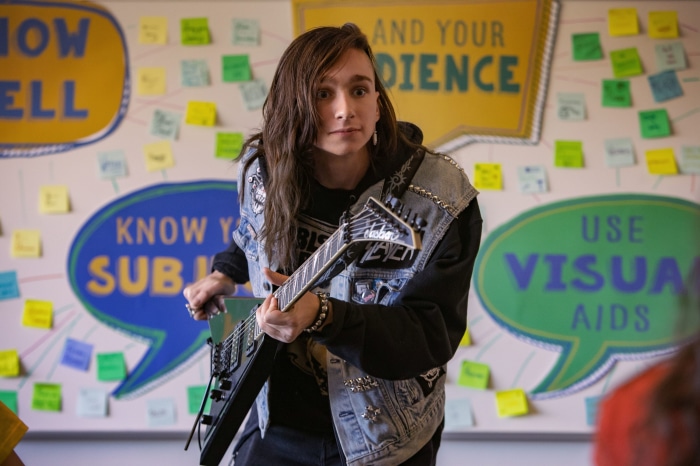 Kevin from Metal Lords with a guitar