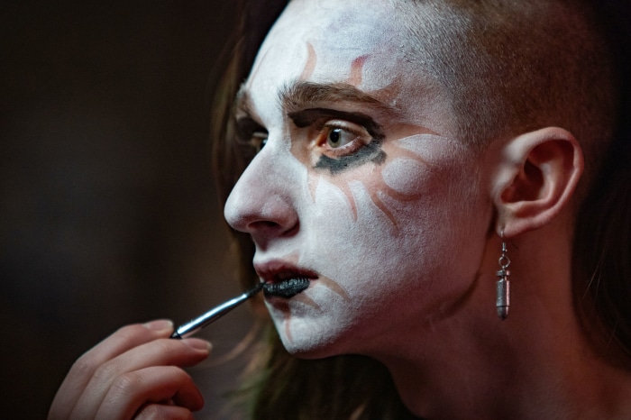 Adrian Greensmith applying makeup for Metal Lords