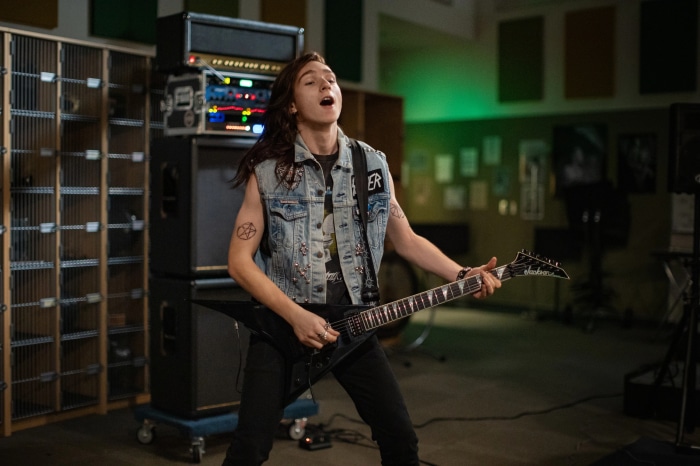 Kevin from Metal Lords playing guitar