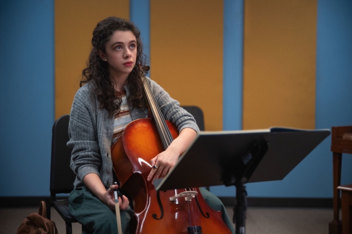 Isis Hainsworth playing cello in Metal Lords