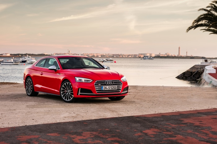 Red Audi S5 Coupe by the Water