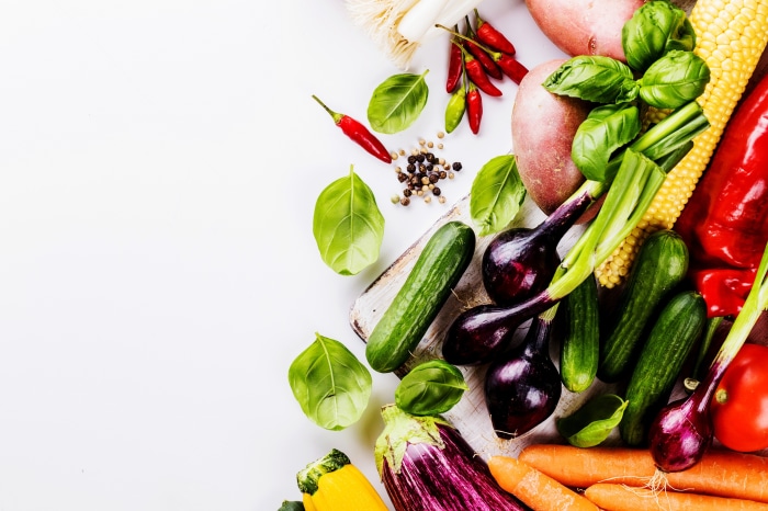 Assortment of fresh vegetables on a white background