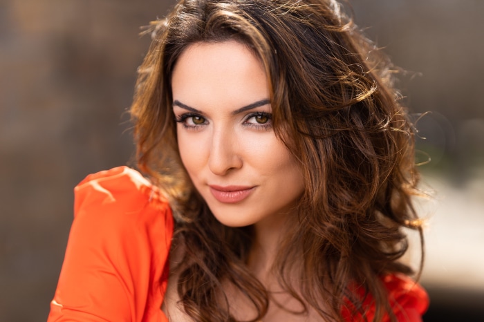 Woman in orange top