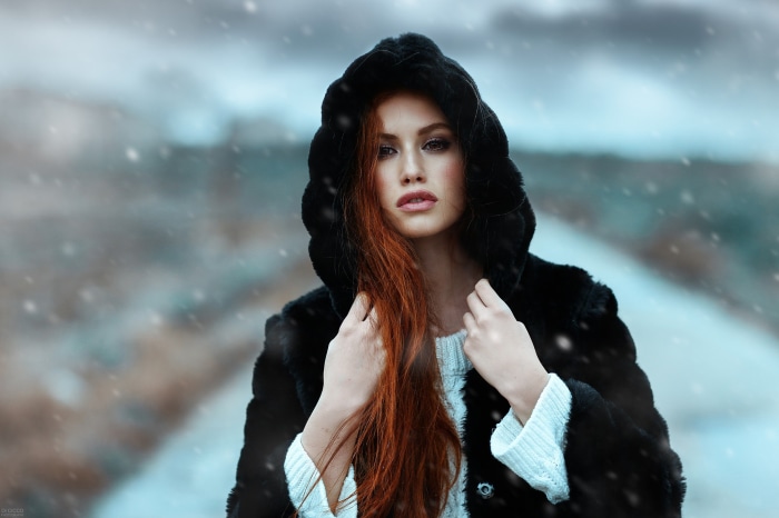 Valentina Galassi in a Fur Hooded Coat in Snow