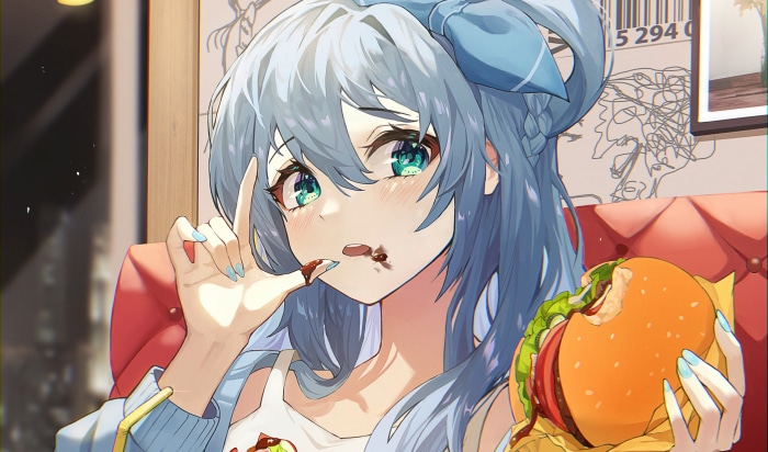 Girl eating a messy burger