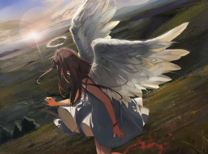 Angel with large wings overlooking a landscape