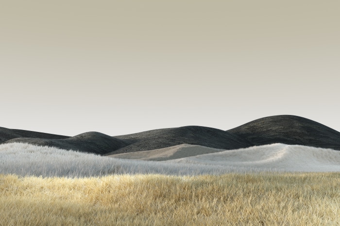 Abstract landscape with rolling hills and dry grass