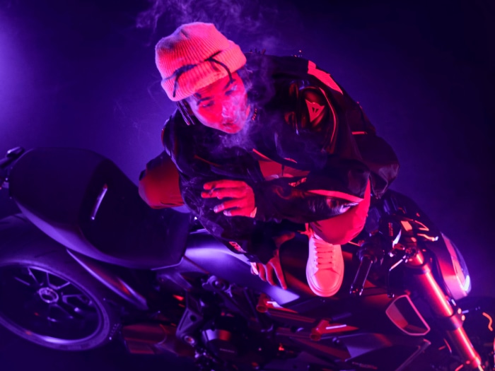 Matuê on a motorcycle