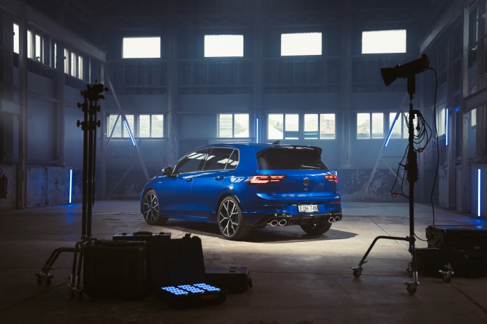 Blue Volkswagen Golf R in a studio