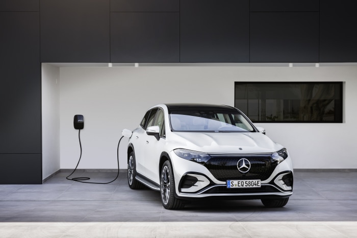 White Mercedes-Benz EQS 580 4MATIC SUV charging
