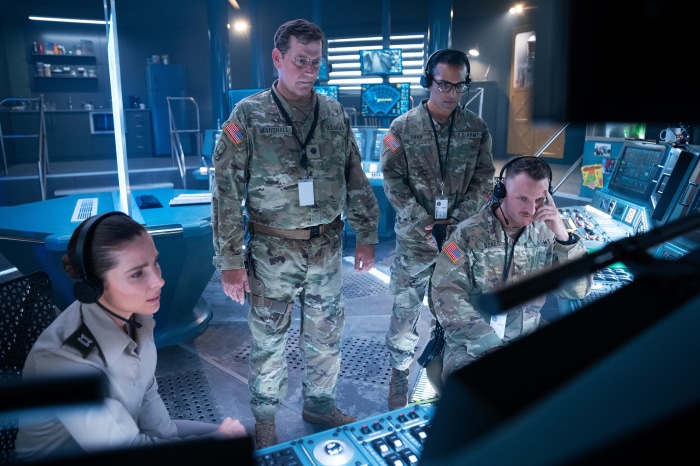 Military personnel in a command center