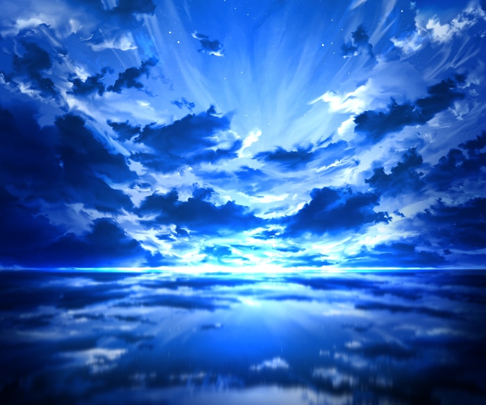 Blue sky with clouds reflected in water