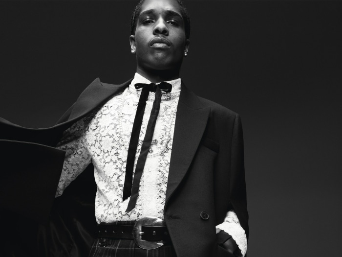 A$AP Rocky in a black suit and lace shirt