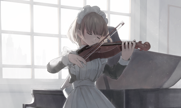 Girl playing violin in front of a window
