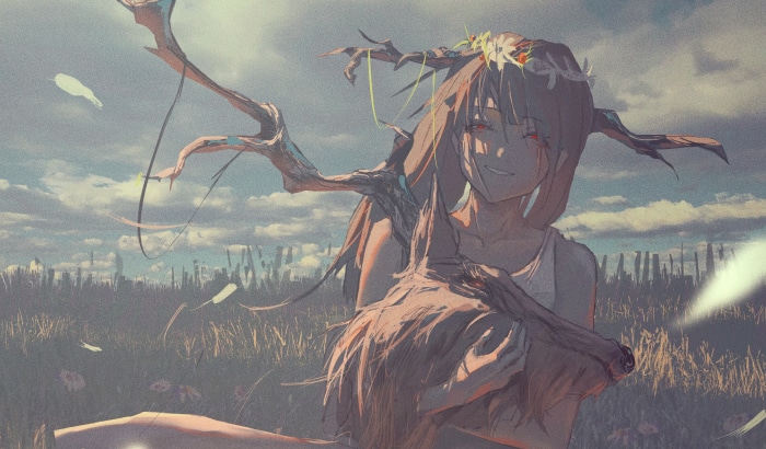 Girl with tree branches in a field