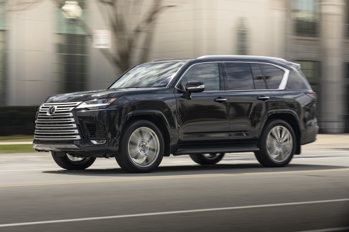 Black Lexus LX 600 4K driving on a street