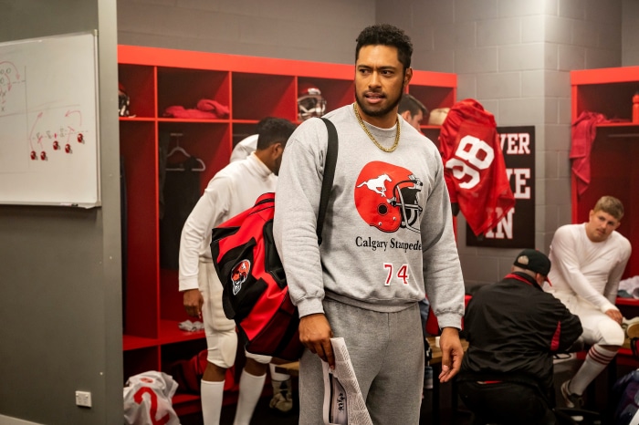 Uli Latukefu in a locker room