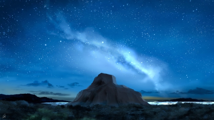 Night sky with Milky Way over a rocky landscape
