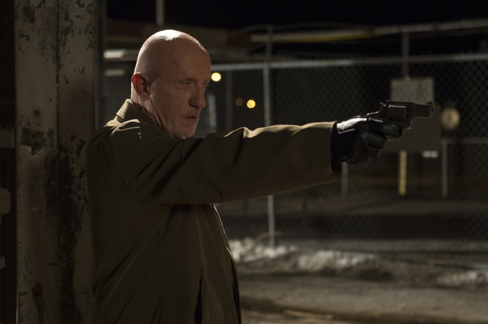 Mike Ehrmantraut from Better Call Saul holding a gun