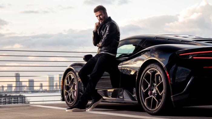 David Beckham Poses with a Black Maserati Car