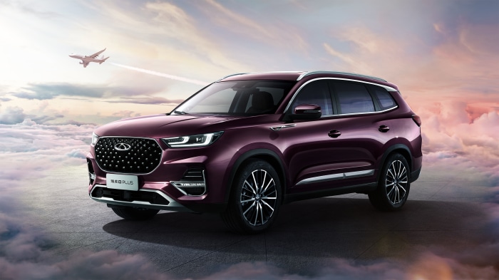 Chery Tiggo 8 Plus SUV in clouds with airplane