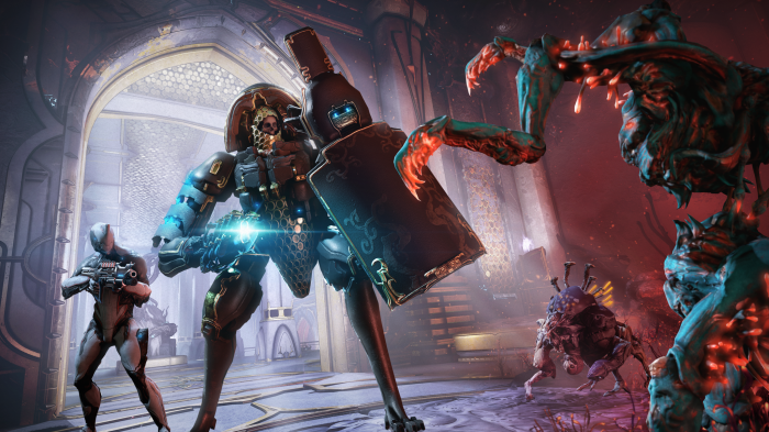 Warframe characters fighting alien creatures