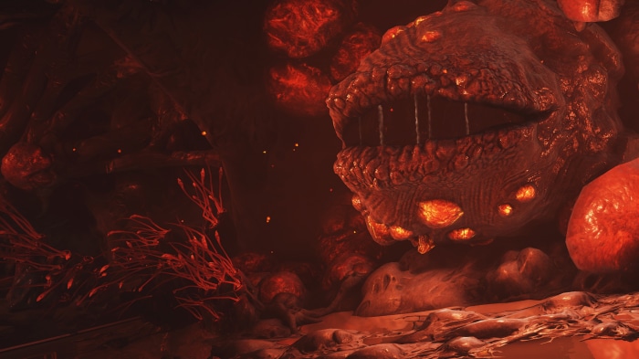 Warframe creature in a dark, organic environment