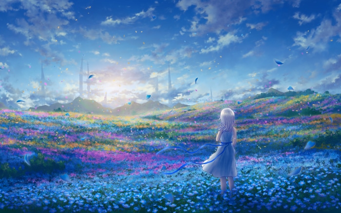 Girl in a flower field with distant towers