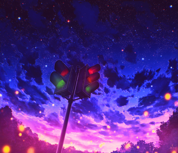 Traffic light against a starry night sky