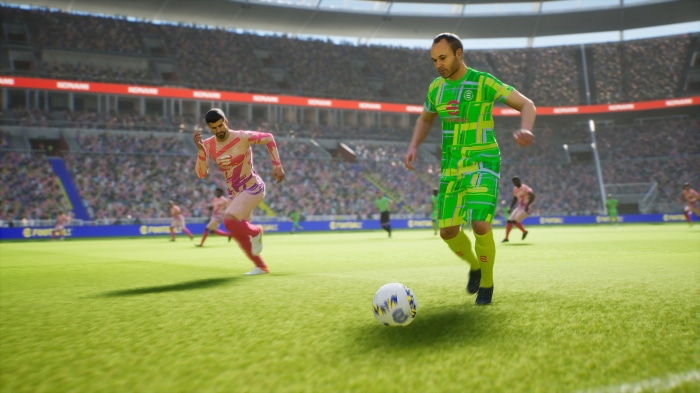 Football players in EFootball 2022 stadium