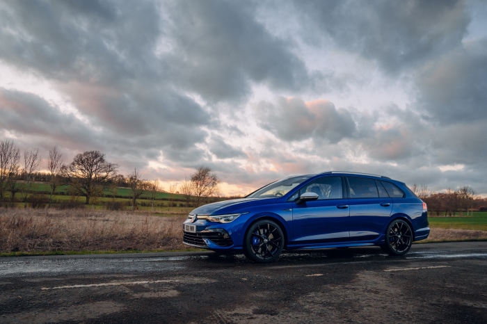 Blue Volkswagen Golf R Estate car on a road